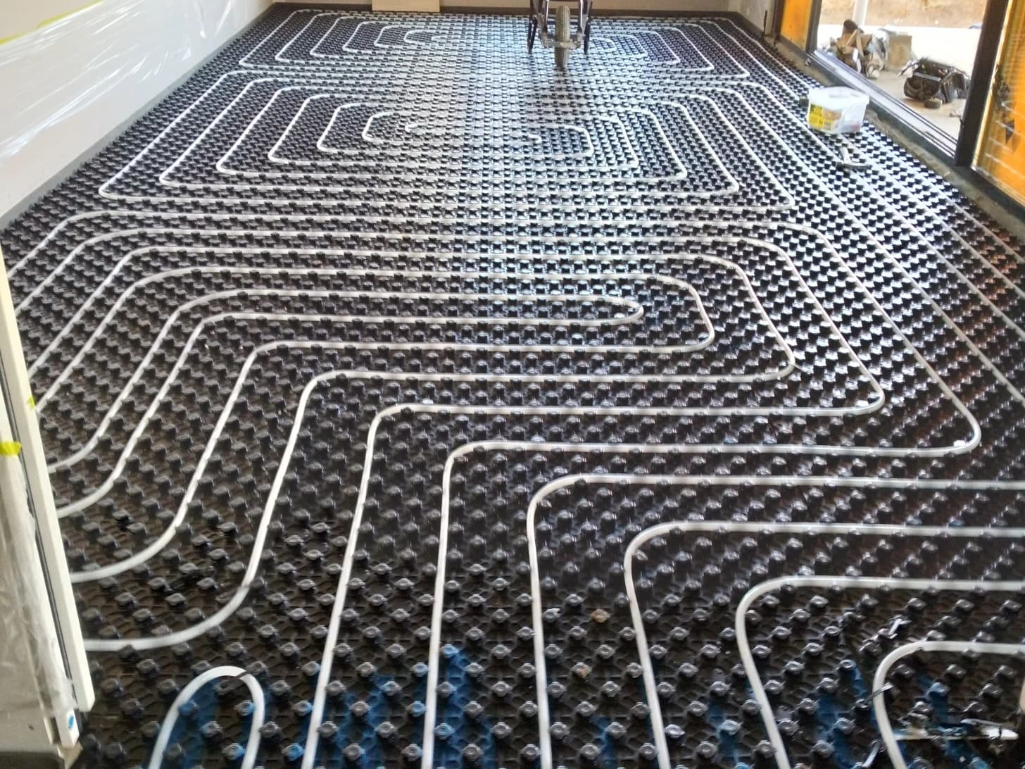 Hydronic underfloor heating pipework prepared for installation